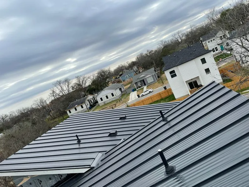 Standing seam metal roof panels with vents for Skylight Repair in Belton